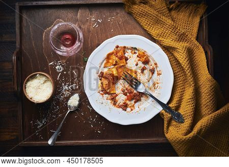 Bolognese pasta food empty plate.Bolognese pasta eaten finished food plate.Italian red meat pasta food. Pasta food. Meat bolognese pasta food.Red tagliatelle pasta.Tagliatelle pasta Food. Red bolognese sauce pasta food on plate.