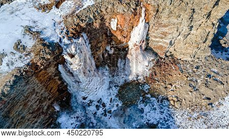 Snow Melts And Refreezes Creating These Majestic Formations On The Rocky Walls.