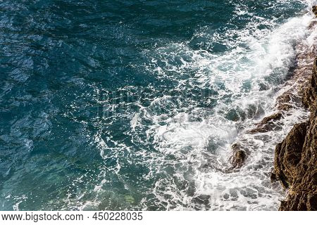 Water Surface And Splashing Waves At Clifs