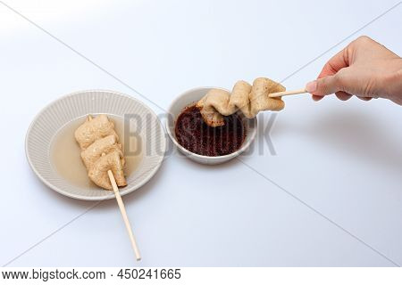 Fish Cake Skewers In A Bowl On A White Background