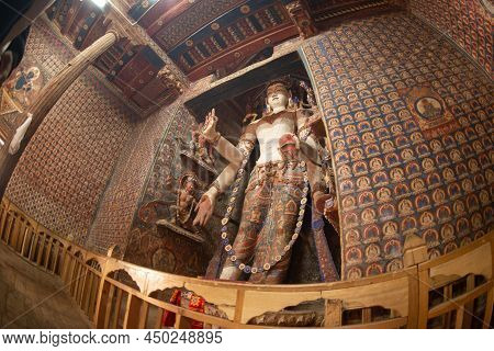 Ladakh , India- May 15,2019 : A Large Buddha Image Or God Made Of Wood. Located Inside Alchi Monaste