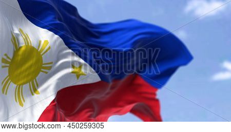Detail Of The National Flag Of The Philippines Waving In The Wind On A Clear Day. The Philippines Is