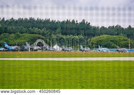 Gdynia, Poland - August 19, 2021. Military Aircrafts Parked At The Military Airport Behind The Fence