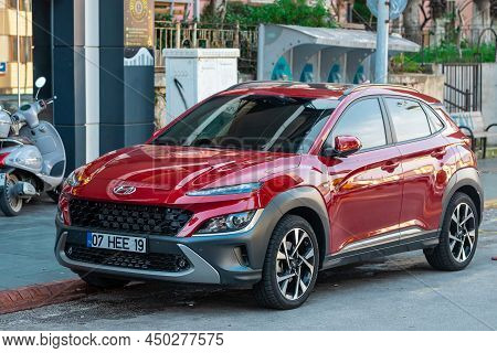 Side; Turkey - February 16 2022:  Red  Hyundai Kona   Is Parked  On The Street On A Warm Summer Day 