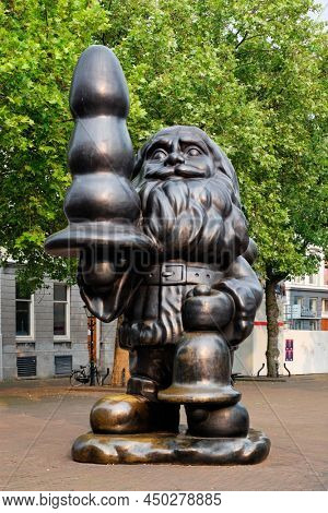 ROTTERDAM, NETHERLANDS - MAY 25, 2018: Santa Claus sculpture, aka Buttplug Gnome, is a 2001 statue by Paul McCarthy in Rotterdam, The Netherlands