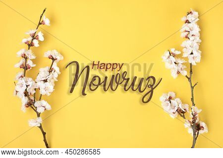 Sprigs Of The Apricot Tree With Flowers On Yellow Background Text Happy Nowruz Holiday Concept Of Sp