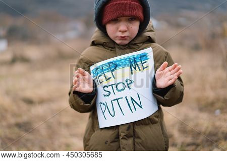 Stop Putin. War Of Russia Against Ukraine. Ukrainian Crying Boy Asks To Stop The War In Ukraine. Chi
