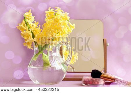 Pring Is A Time Of Good Mood: A Bouquet Of Yellow Hyacinths, A Mirror, Powder And A Brush On A Paste