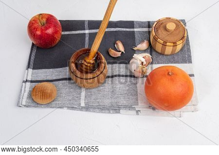 Fermented Apple, Grapefruit Garlic Cloves Honey, A Rich Source Of Probiotics, White Background