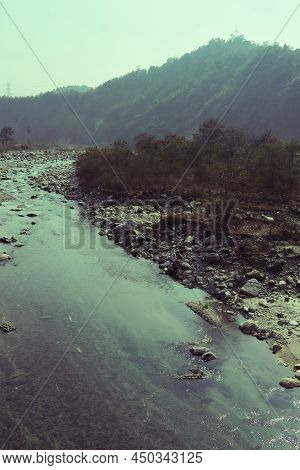 Mountain Stream (balason River) Flowing Down To The Gangetic Plain From Himalayan Foothills In The T