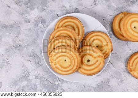 Top View Of Round Ring Shaped Spritz Biscuits, A Type Of German Butter Cookies Made By Extruding Dou