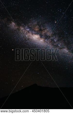 Amazing Night Scenery With Beautiful Milky Way On The Sky With Camping Tent In The Foreground At Sen