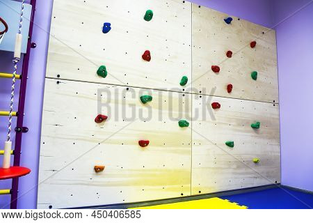 Climbing Wall In The Children's Center For Working With Special Children And Playing Sports