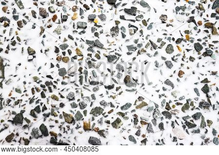 Stones With Snow As A Texture Element On The Ground