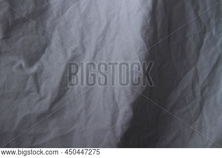 Texture Of White Fabric. White Background Close Up. Factory Fabric In White. White Fabric Background
