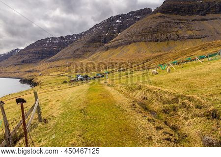 View Of The Muli On Bordoy Island. A Small Village Situated On The Slope Of A Hill. Faroe Islands.