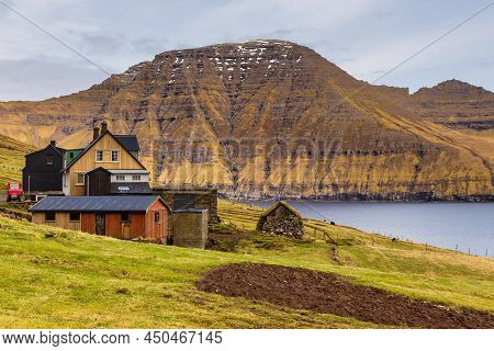 View Of The Muli On Bordoy Island. A Small Village Situated On The Slope Of A Hill. Faroe Islands.