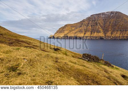 Steep Coast Of The Island Of Bordoy. Volcanic Archipelago In The Atlantic Ocean, Muli, Faroe Islands