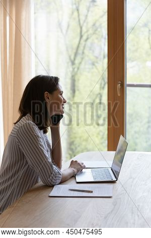 Smiling Woman Looks Out Window Enjoy Pleasant Conversation On Phonecall