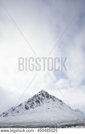 Buachaille Etive Mor Covered In Snow During Winter Aerial View