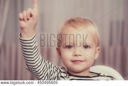 I Have Excellent Idea. Boy Cute Toddler Blue Eyes Pointing Upwards Index Finger. Creative Idea Conce