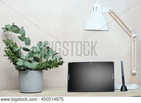 Template Pc Tablet Screen With Digital Pen On A Wooden Table. Minimal Scandinavian Design Desk Lamp 