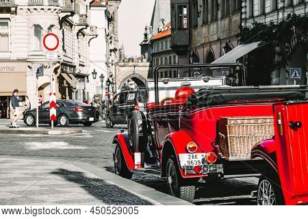 Prague, Czech Republic - May 23, 2017: Retro-styled Sightseeing Tour Cars At Lesser Town Square. Pra