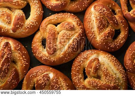 Bavarian Pretzels And Glass Of Lager Beer. Oktoberfest Food Menu, Traditional Salted Pretzels Over O