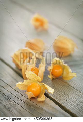 Physalis(exotic Fruit) On An Aged Wooden Surface