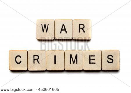 Concept On The War In Ukraine Showing A Sign Reading War Crimes