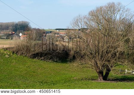 Merchtem, Flemish Brabant Region, Belgium - 03 06 2022: View Over The Fields And Green Hills At The 