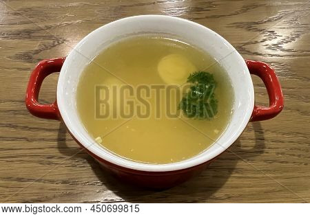 Chicken Soup Broth With Egg . High Quality Photo