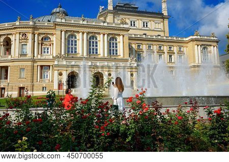 Odesa, Ukraine - September 25: The Lady Makes Photo On Smartphone Near Odesa National Academic Theat