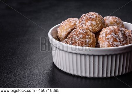 Tasty Homemade Gingerbread Cookies On Dark Concrete Table