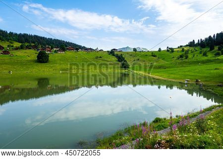 Lake Of The Confins And Mountain Landscape In La Clusaz, Haute-savoie, France