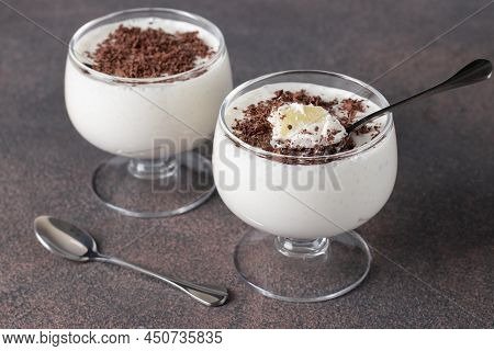 Homemade Pudding Jelly Of Cream Or Milk With Pinepple, Sprinkled With Chocolate Chips In Two Cups On