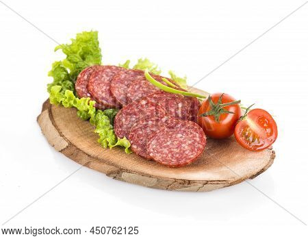 Pork Salami Slices On A Wooden Board(horizontal)