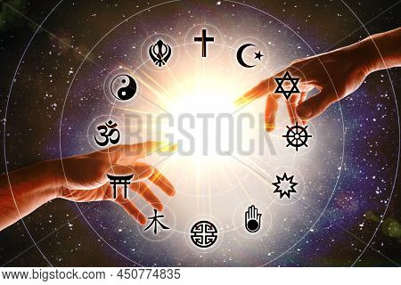 Hands And Flash With Symbols Of The Most Representative Religions In The World With A Background Of 