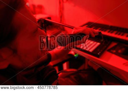 Partial Image Of Emotional Male Singer Singing Song In Microphone At Home Studio. Domestic Hobby, En