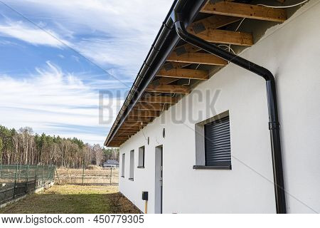 Roof Trusses Through Which The Electric Cable Passes To Connect The Lighting In The Soffit.