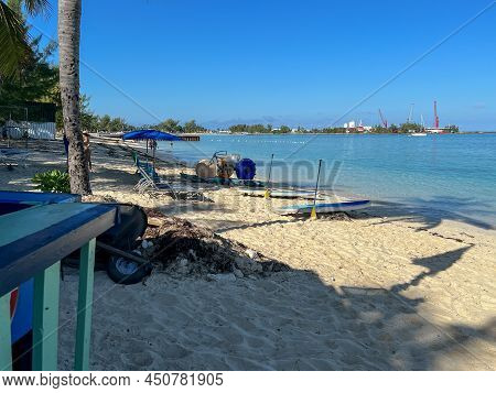 People Enjoying Junkanoo Beach In Nassau, Bahamas.