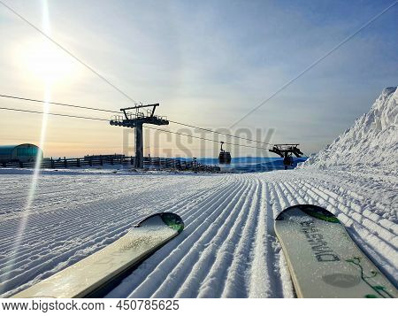 Skiing Downhill. Downhill Skiing On A Squandered Close-up