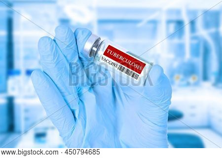 Vaccine, Tuberculosis. Bcg, Medical Vaccine Ampoule In The Hands Of A Doctor. Soft Blue Blurred Clin