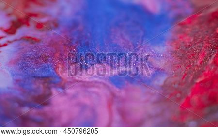 Ink Blend. Artistic Hobby. Colorful Abstract Bakgrund. Purple Blue Pink Glitter Paints Mix