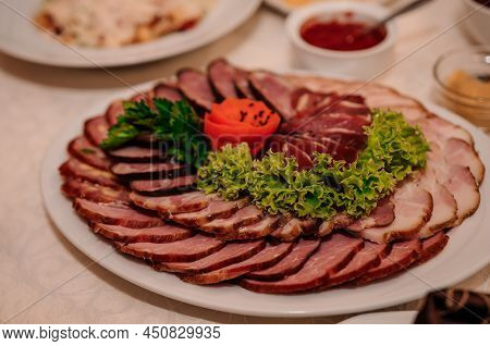 Slicing Different Types Of Meat. Meat Snacks On The Table. Wedding Buffet. Catering
