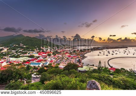 Marigot, St. Martin town skyline in the Caribbean at dusk.