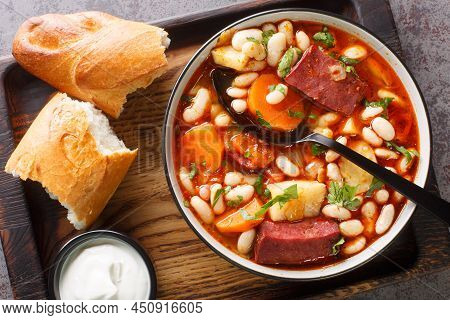 Babgulyas Is Gulyas Soup With Beans, Meat, Celery, Carrot And Onion Closeup In The Plate On The Wood