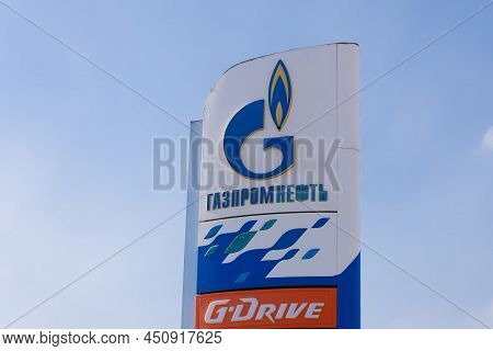 Krasnoyarsk, Russia - March 13, 2022: Gas Station Gazprom Neft Logo Against Blue Sky