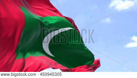 Detail Of The National Flag Of Maldives Waving In The Wind On A Clear Day. Maldives Is An Archipelag