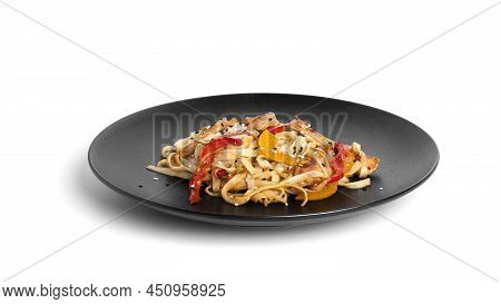 Wok Noodles With Chicken Isolated On A White Background. Pasta With Chicken Fillet.